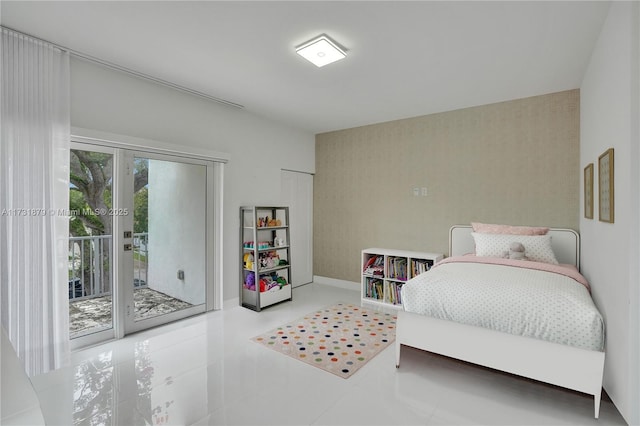 bedroom featuring access to outside and french doors