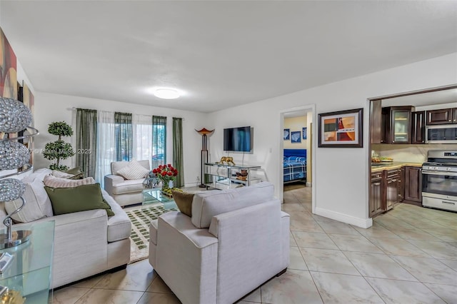 living room featuring light tile patterned flooring