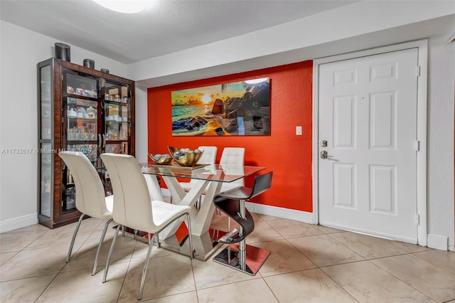 view of tiled dining space