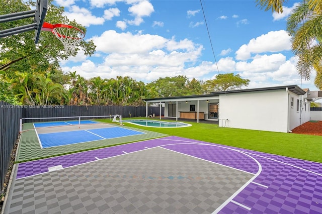 view of basketball court featuring a yard, tennis court, and a fenced in pool