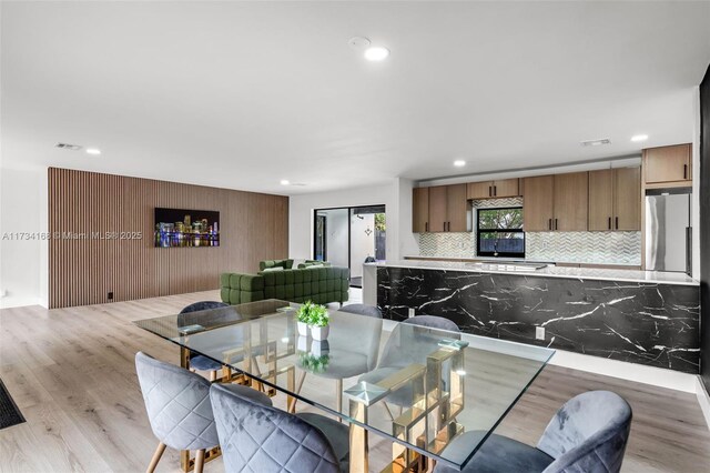 dining room featuring light wood-type flooring