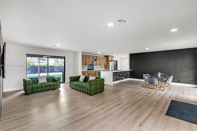 living room featuring light hardwood / wood-style floors