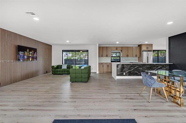 living room featuring light hardwood / wood-style flooring