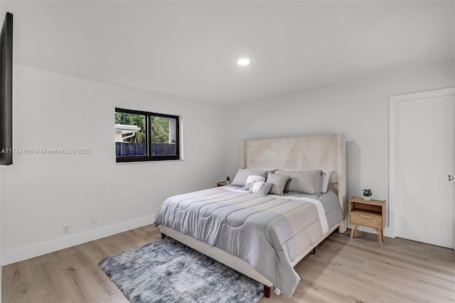 bedroom featuring light wood-type flooring