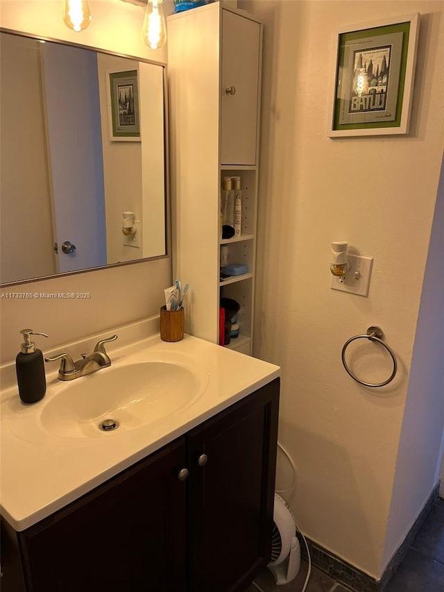 bathroom featuring vanity and tile patterned flooring