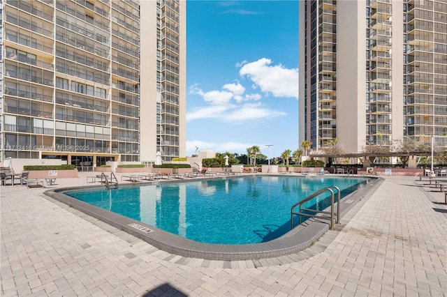 view of pool featuring a patio