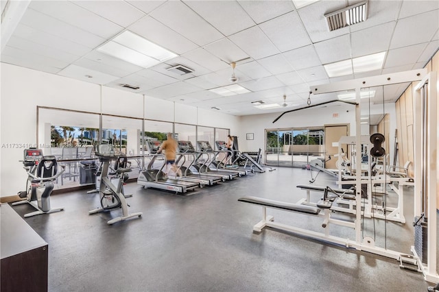 gym with a drop ceiling