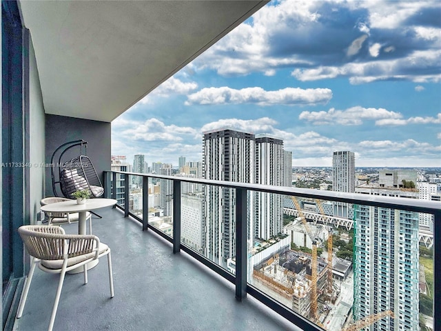 balcony featuring a city view