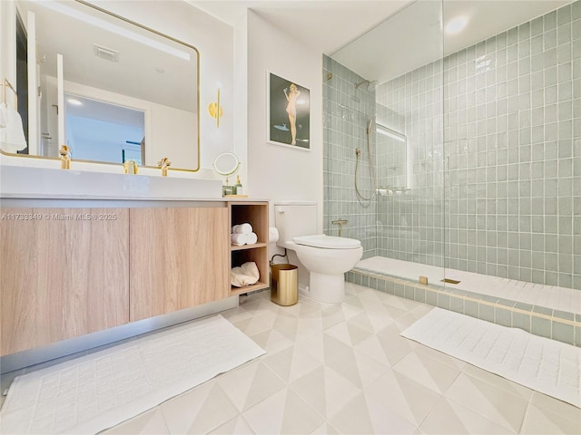 full bath featuring tile patterned floors, visible vents, toilet, walk in shower, and vanity