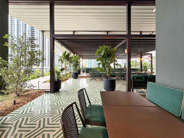 view of patio featuring outdoor dining space and an outdoor hangout area