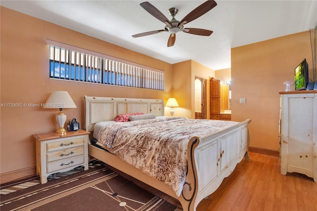 bedroom featuring ceiling fan and light wood-type flooring