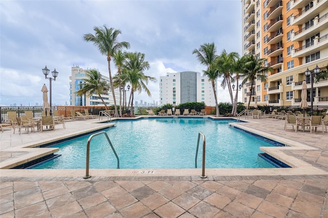 view of pool featuring a patio