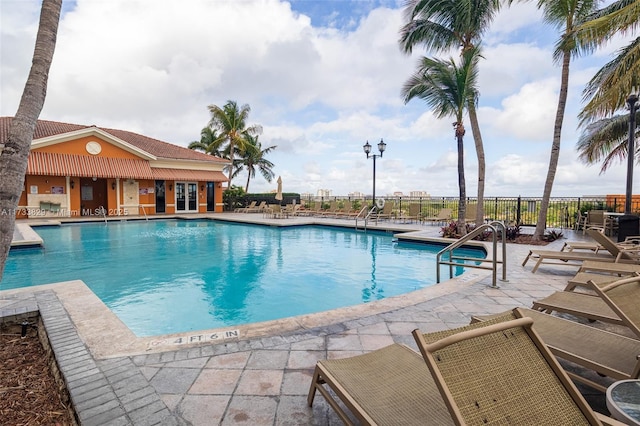 view of pool featuring a patio