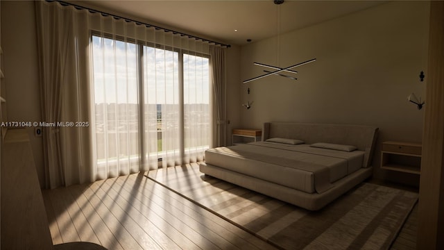 bedroom with hardwood / wood-style floors