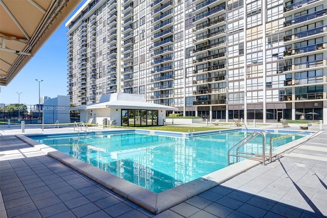 view of pool featuring a patio area