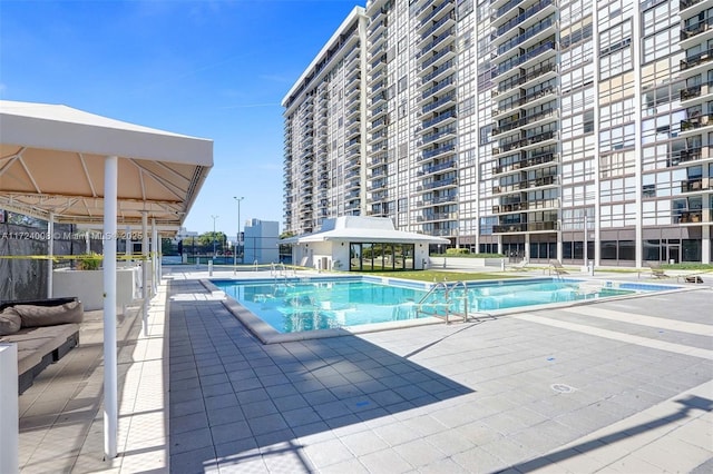 view of pool featuring a gazebo and a patio