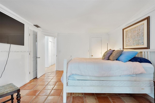 bedroom featuring ornamental molding