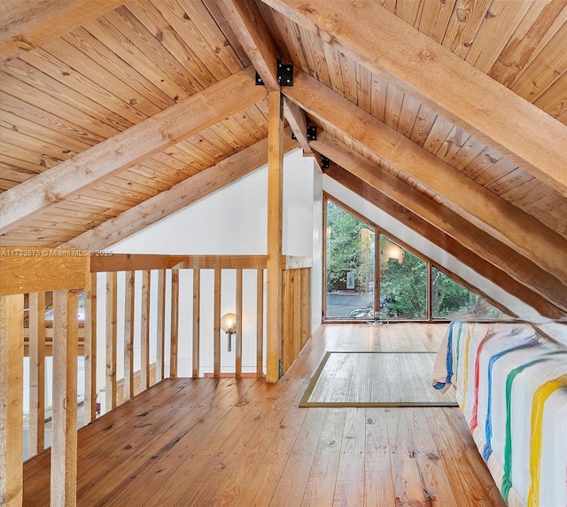 additional living space with vaulted ceiling with beams, wood ceiling, and light hardwood / wood-style floors