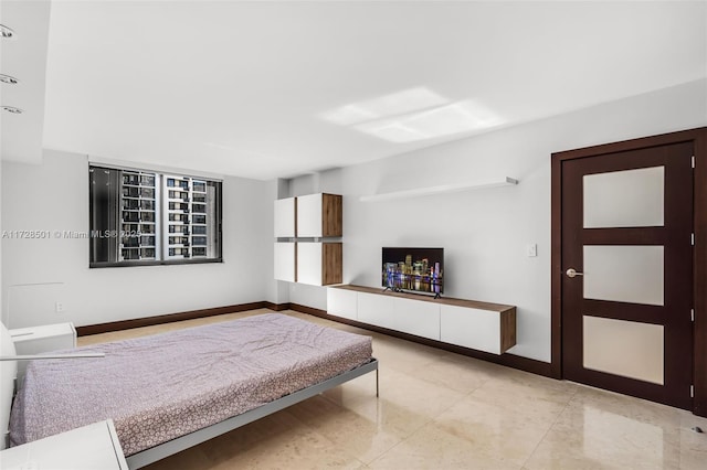 540 Brickell Key Dr Unit 1021, Miami, FL 33131 - bedroom with baseboards