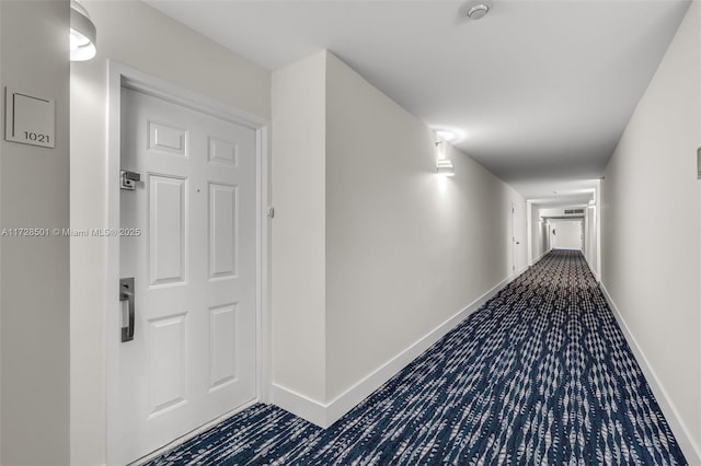 540 Brickell Key Dr Unit 1021, Miami, FL 33131 - corridor featuring baseboards and carpet floors