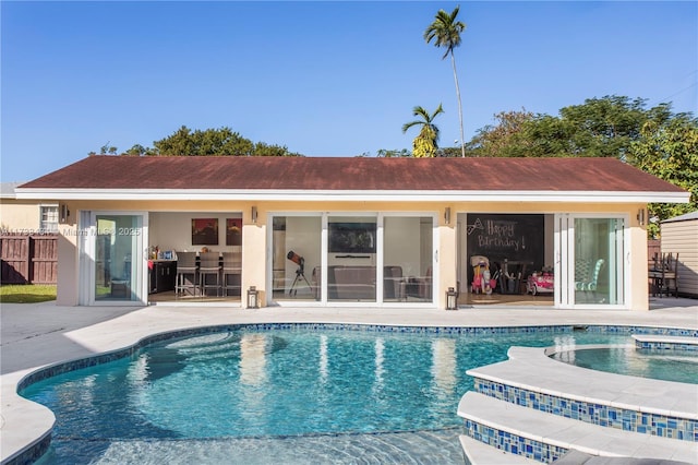 view of pool featuring a patio