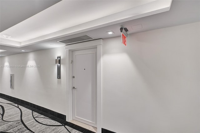 view of exterior entry featuring visible vents