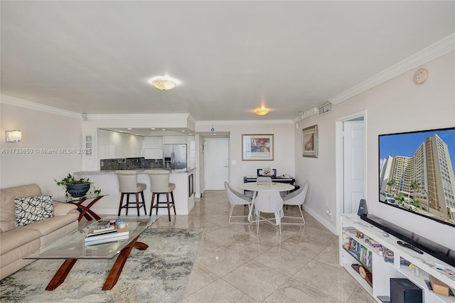 living area featuring baseboards, ornamental molding, and marble finish floor