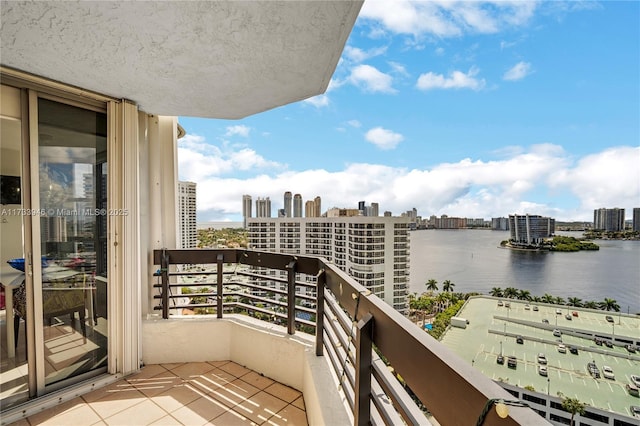 balcony featuring a water view