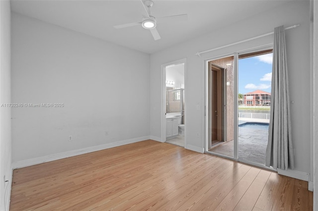 empty room with light hardwood / wood-style floors and ceiling fan