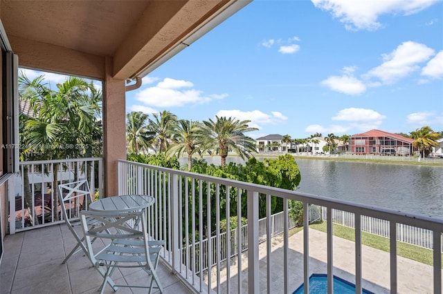 balcony featuring a water view