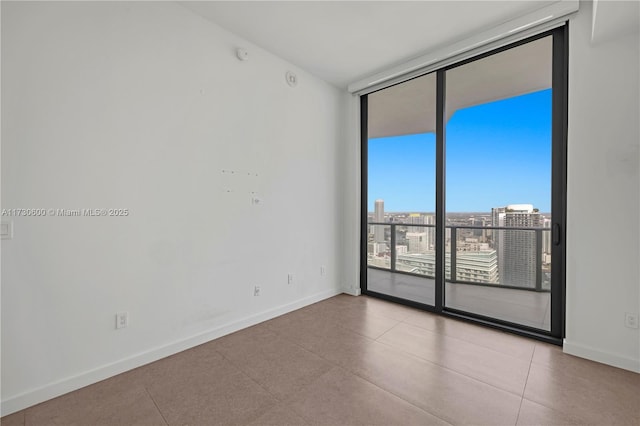 empty room featuring expansive windows