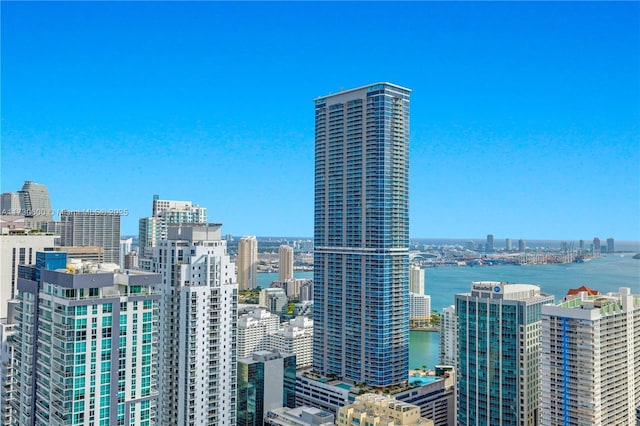 property's view of city with a water view