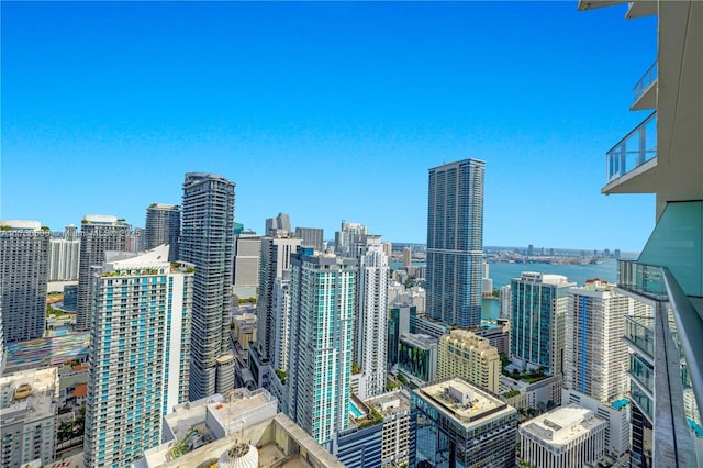 property's view of city featuring a water view