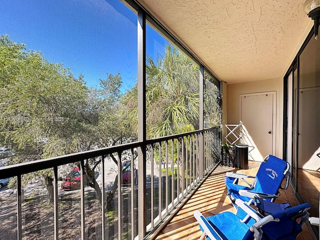 unfurnished sunroom featuring a wealth of natural light