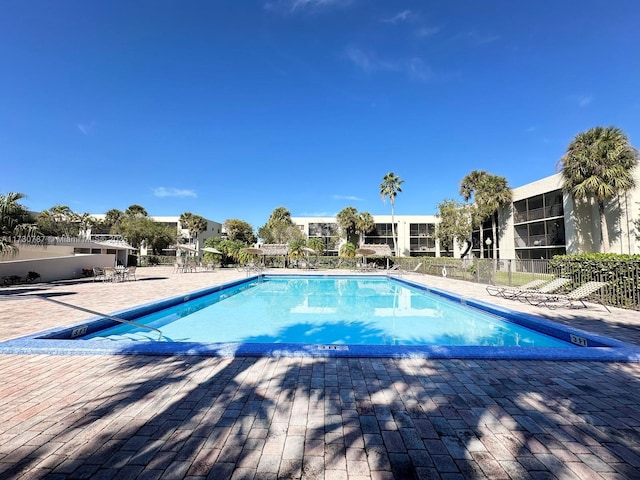 view of swimming pool featuring a patio