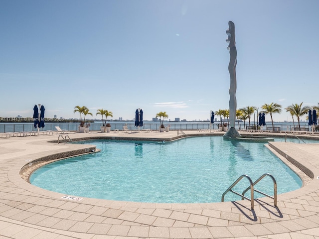 pool with a patio