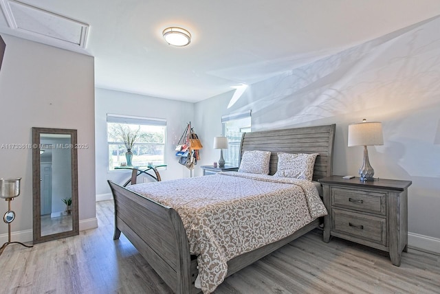 bedroom featuring light hardwood / wood-style flooring