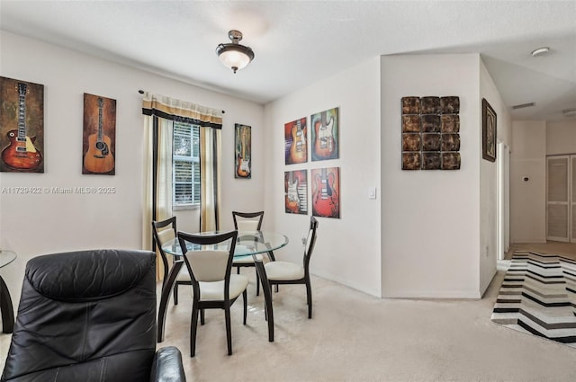13114 SW 44th St Unit 2204, Miramar, FL 33027 - dining area featuring light carpet and baseboards