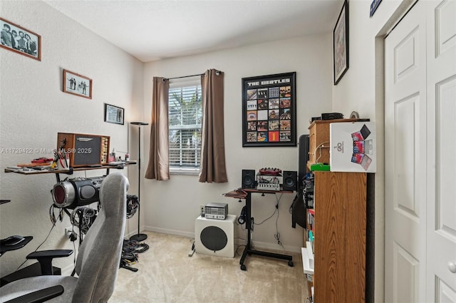 exercise room with light colored carpet