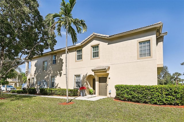 13114 SW 44th St Unit 2204, Miramar, FL 33027 - view of front facade featuring a front yard and stucco siding