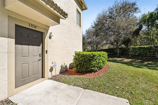 13114 SW 44th St Unit 2204, Miramar, FL 33027 - entrance to property featuring stucco siding and a lawn