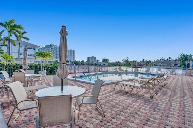 view of pool featuring a patio area