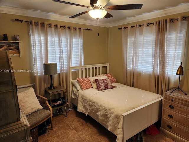 bedroom featuring tile patterned floors, ornamental molding, and ceiling fan