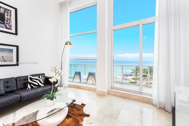 5445 Collins Ave Unit M15, Miami Beach, FL 33140 - living area featuring plenty of natural light and a water view