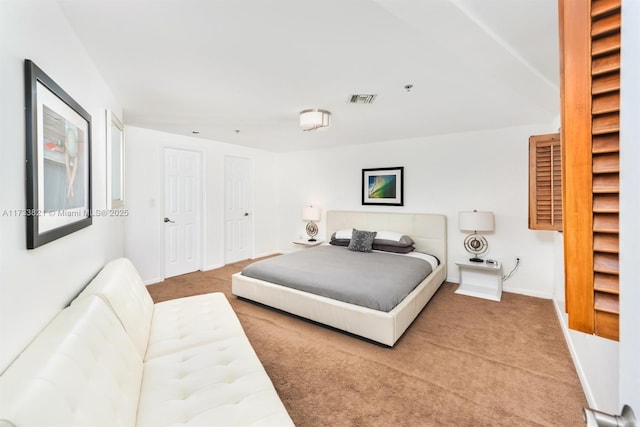 5445 Collins Ave Unit M15, Miami Beach, FL 33140 - bedroom featuring visible vents, carpet floors, and baseboards