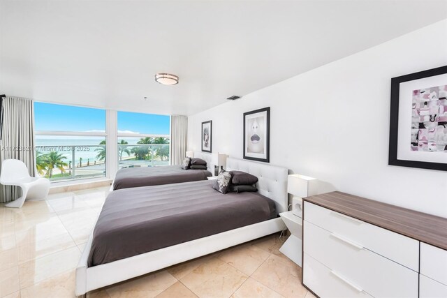 5445 Collins Ave Unit M15, Miami Beach, FL 33140 - bedroom featuring floor to ceiling windows and visible vents