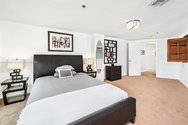 5445 Collins Ave Unit M15, Miami Beach, FL 33140 - bedroom with visible vents, carpet floors, and baseboards