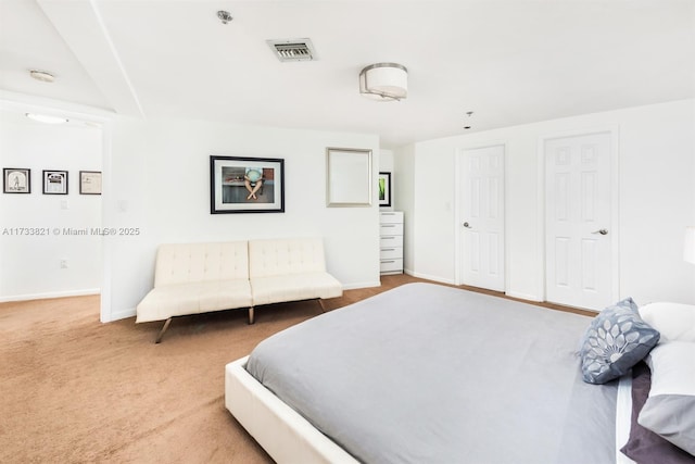 bedroom featuring carpet