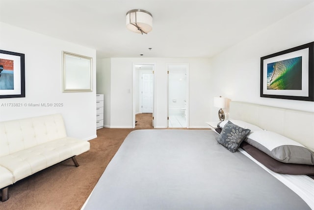 5445 Collins Ave Unit M15, Miami Beach, FL 33140 - carpeted bedroom with ensuite bath and baseboards