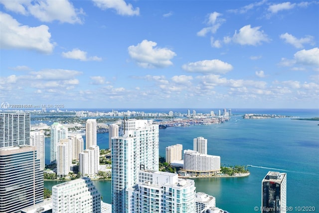 birds eye view of property featuring a water view